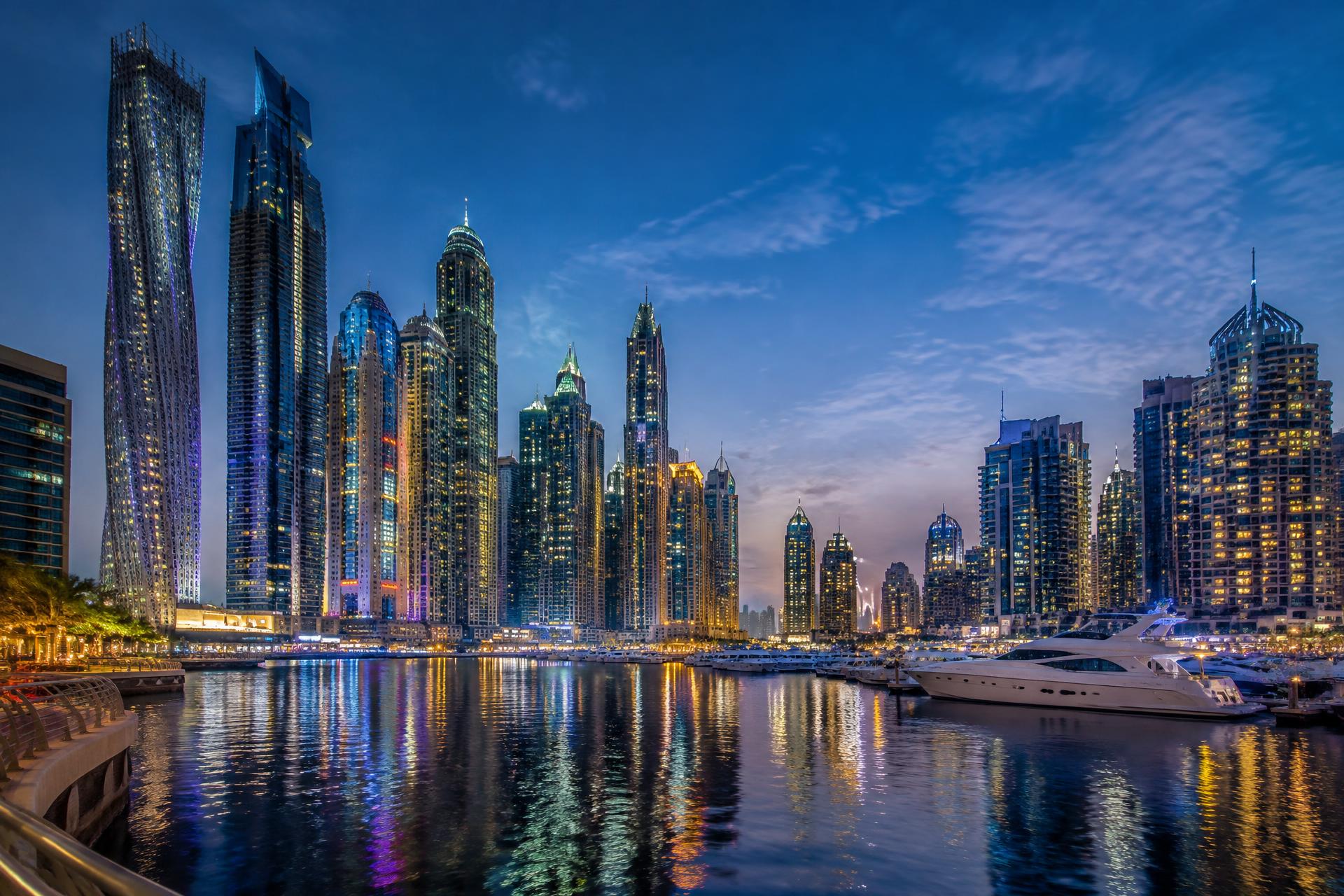 Dubai Marina skyline and yachts at blue hour